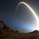 An Atlas V rocket lifts off from Cape Canaveral Air Force Station’s Launch Complex 41, illumining nearby Kennedy Space Center’s dune restoration site. Photo Courtesy Tony Gray/NASA.